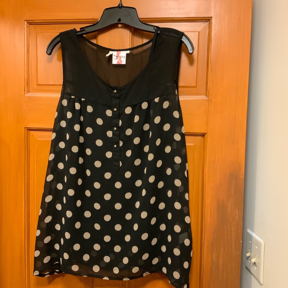 Sheer polka dotted top with tank top underneath